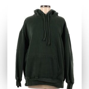 Oversized green hooded sweatshirt